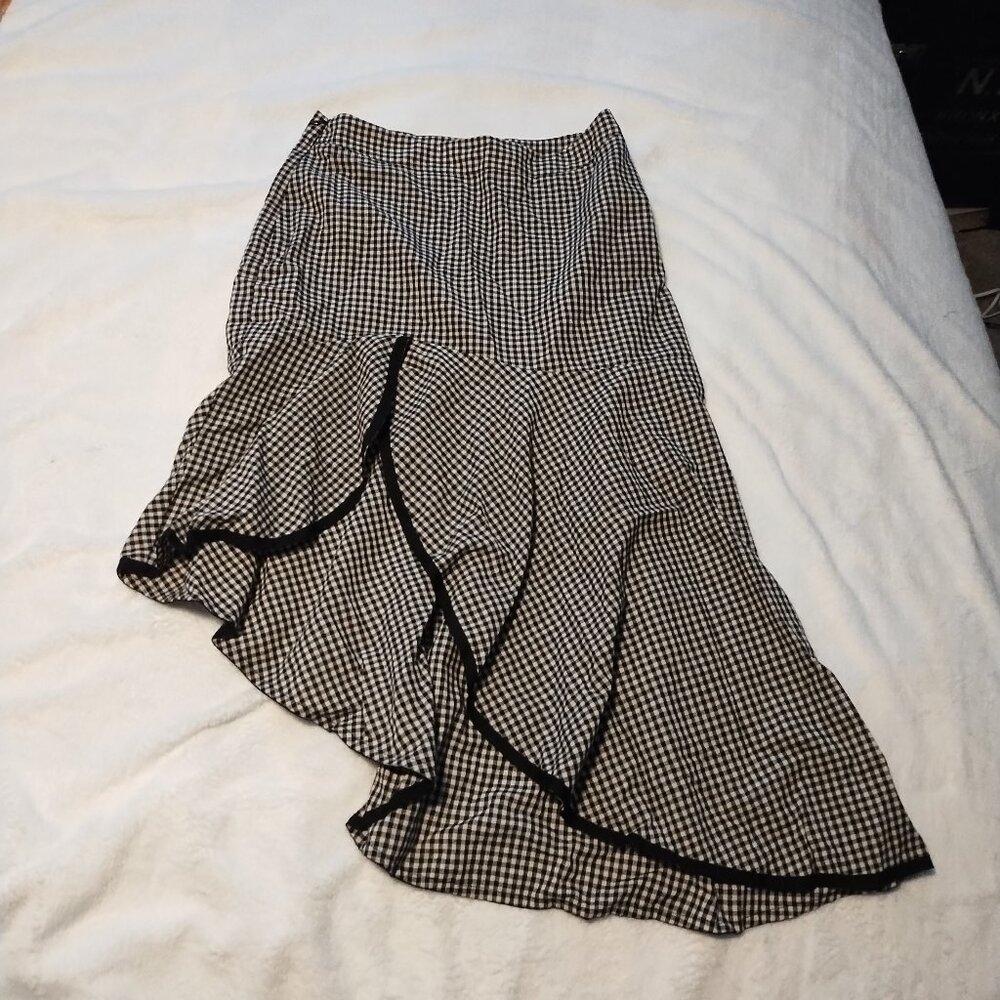 Two Skirts, one red polka dot pencil and one black/white plaid small
